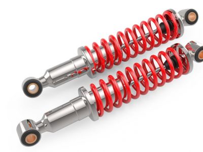 39034202 - group of chrome car shock absorbers with red springs isolated on white background. auto parts